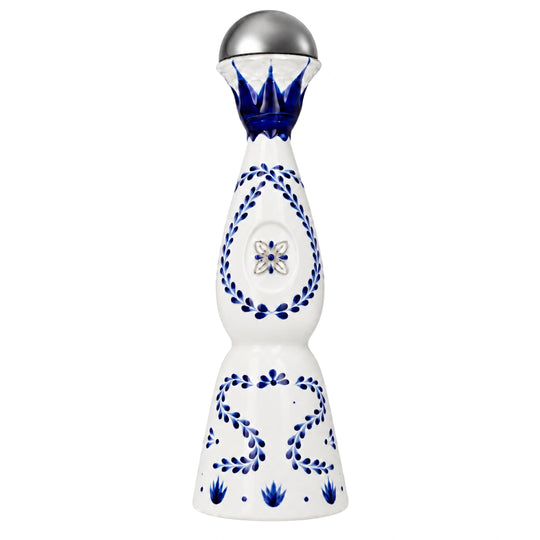 A Clase Azul bottle containing blue hand-painted floral patterns and a silver faceted glass top, shown on a solid white background.